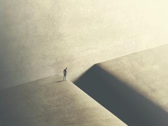 person facing a graphical illustration of a big gap or gulf